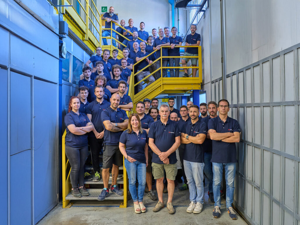 Team photo of Compositex staff in Vicenza, showcasing the people behind the company’s advanced carbon fiber engineering and manufacturing.